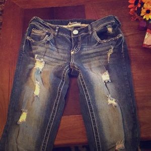 Amethyst distressed skinny jeans